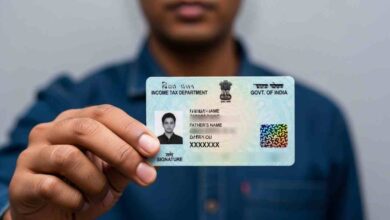Pan Card In Hand (1)