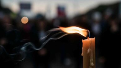 A Single Lit Candle Wind