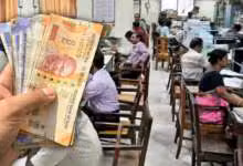 Government Employees Office Money in Hand