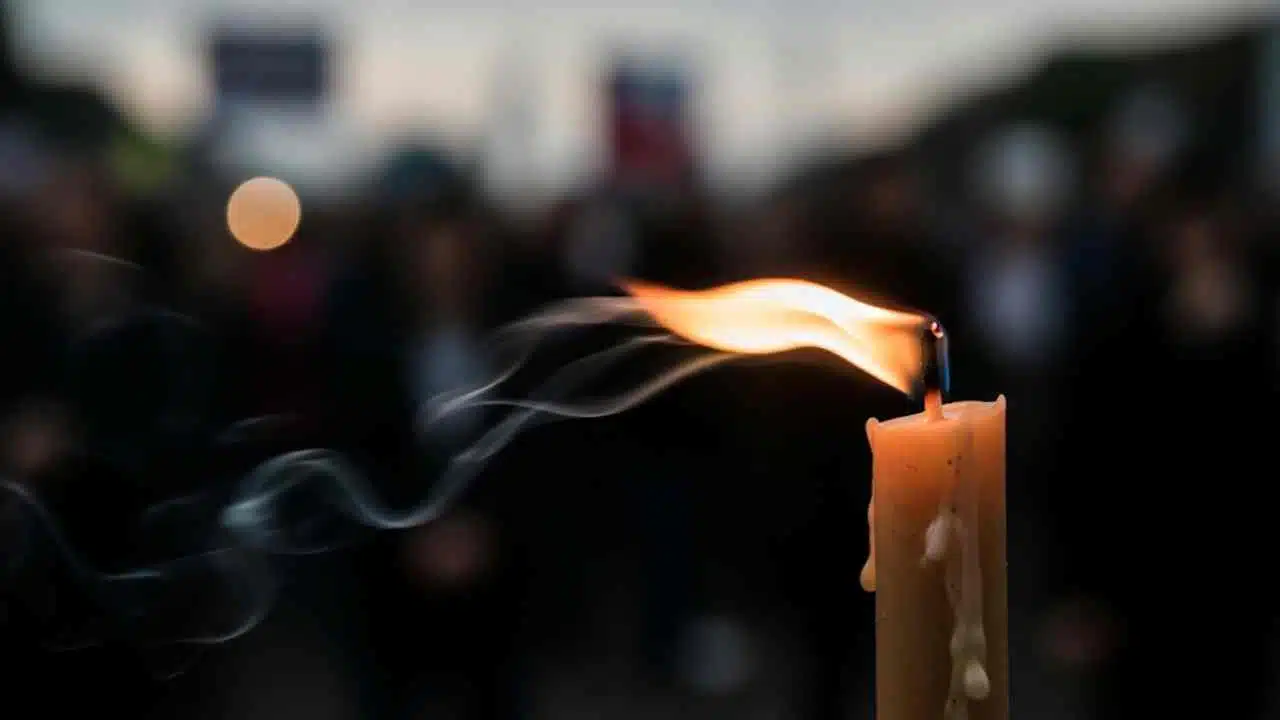 A Single Lit Candle Wind