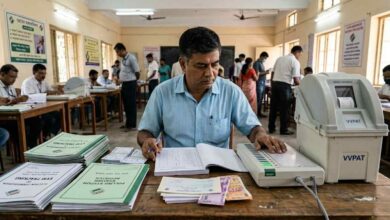 Polling Officer Working With Evm Vvpat Election